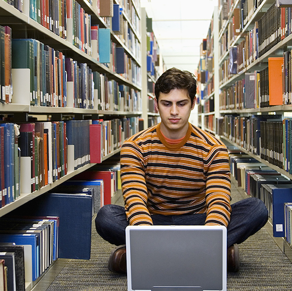 Student in library on laptop