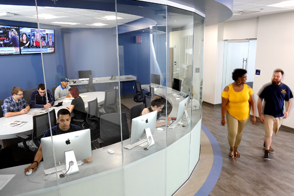 Students work in one of the Karambelas Media and Communication Center media labs.
