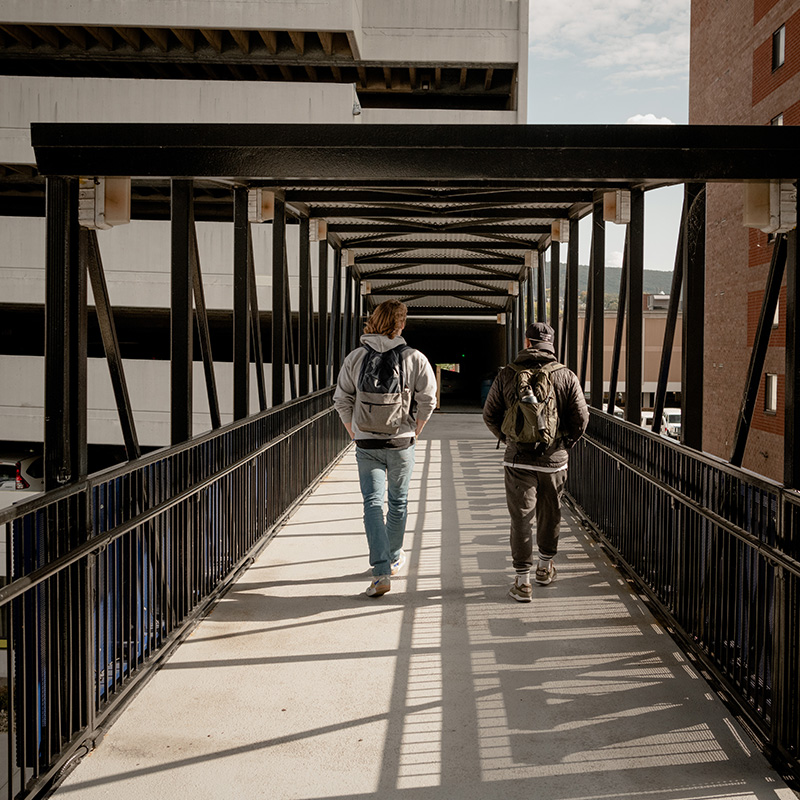 Student at gateway on campus