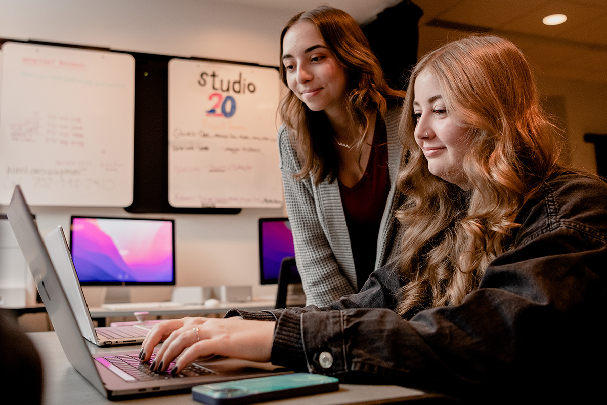 Students work together on a media art project