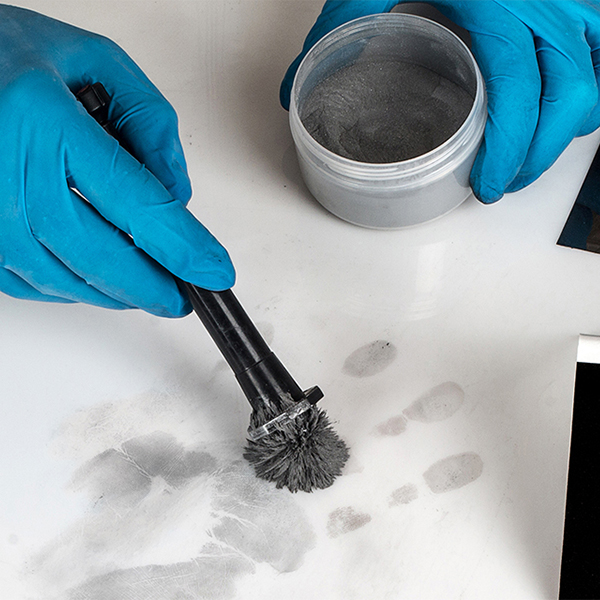 a crime scene simulation with fingerprint dust